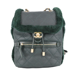 CHANEL | Dark Green Shearling Quilted CC Leather Backpack