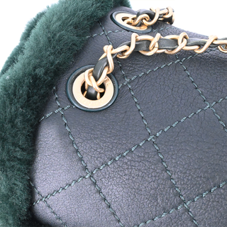 CHANEL | Dark Green Shearling Quilted CC Leather Backpack