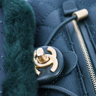 CHANEL | Dark Green Shearling Quilted CC Leather Backpack