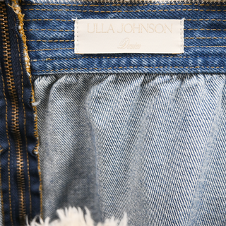 ULLA JOHNSON | The Astrid Frayed Paneled Denim Midi Skirt