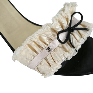 CHANEL | CC Ruffled Bow Mules