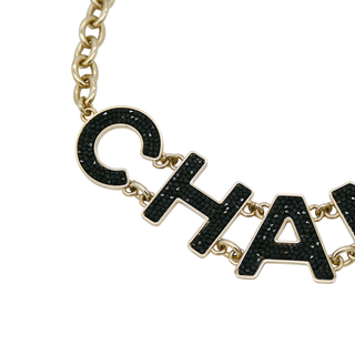 CHANEL | Black Crystal 'CHANEL' Embellished Necklace