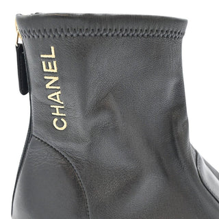 CHANEL | Black Leather Zip Booties