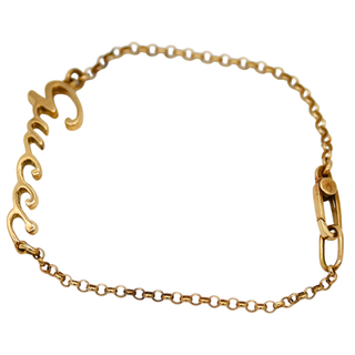 GUCCI | 18K Yellow Gold Script Logo Bracelet