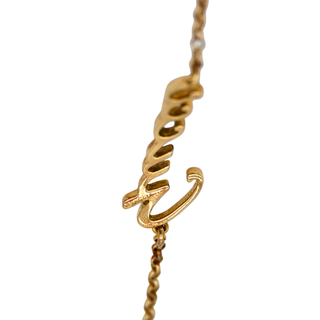GUCCI | 18K Yellow Gold Script Logo Bracelet