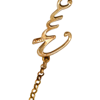 GUCCI | 18K Yellow Gold Script Logo Bracelet