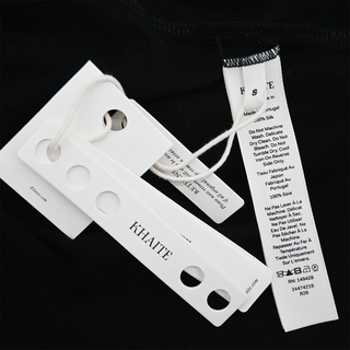 KHAITE | Black Faithful Polo Top