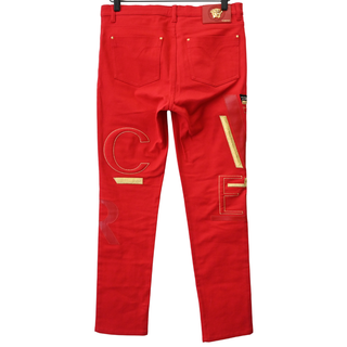 VERSACE | Bright Red 'Versace' Embellished Jeans