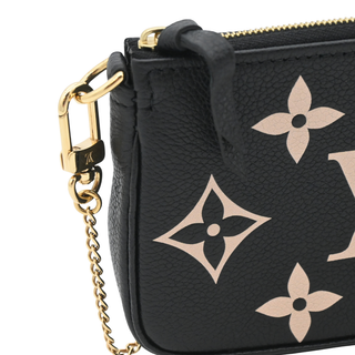 LOUIS VUITTON | Black & Beige Monogram Empreinte Mini Pochette Bag