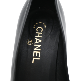Black Leather Camellia Cap Toe Pumps