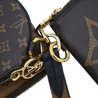 Monogram Giant Reverse Trio Pouch Wristlet