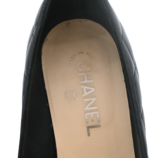 Black Quilted Leather Cap Toe Pumps