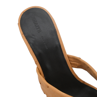 KHAITE | Liria Tan Ostrich Leather Crisscross Mule Sandals