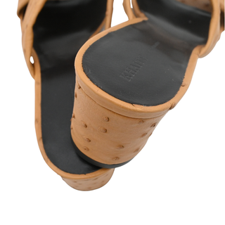 KHAITE | Liria Tan Ostrich Leather Crisscross Mule Sandals