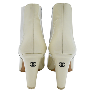 CHANEL | Off-White Interlocking CC Logo Chelsea Boots