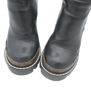Star Trail Black Leather Monogram Platform Ankle Boots