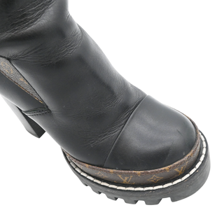 Star Trail Black Leather Monogram Platform Ankle Boots