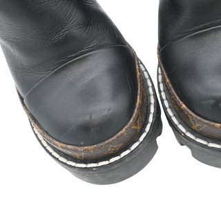 Star Trail Black Leather Monogram Platform Ankle Boots