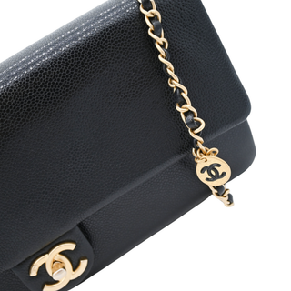 CHANEL | CC Black Caviar Leather Maxi Clutch Bag