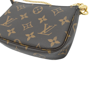 Monogram Canvas Mini Pochette Accessoires