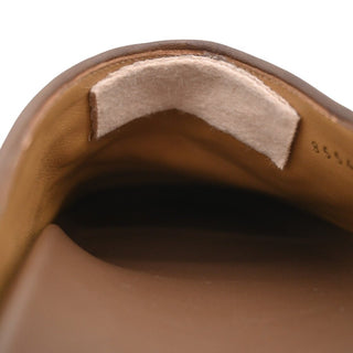 GG Embossed Suede Mules