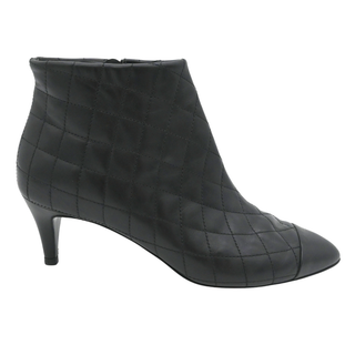 CHANEL | Quilted Leather Camellia Zip Ankle Boots