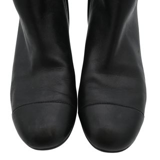 CHANEL | Quilted Leather Turnlock Ankle Boots