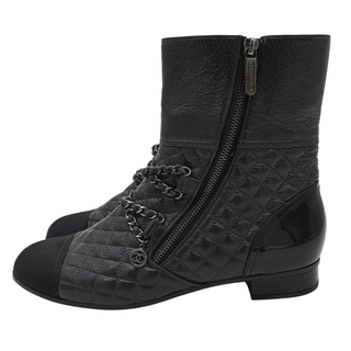 Quilted Leather Chain-Embellished Cap Toe Ankle Boots