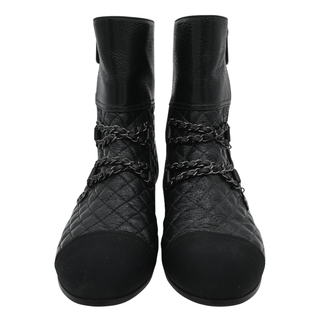 Quilted Leather Chain-Embellished Cap Toe Ankle Boots