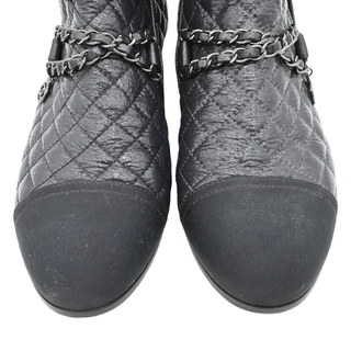 Quilted Leather Chain-Embellished Cap Toe Ankle Boots