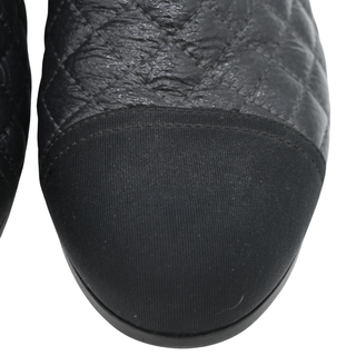Quilted Leather Chain-Embellished Cap Toe Ankle Boots